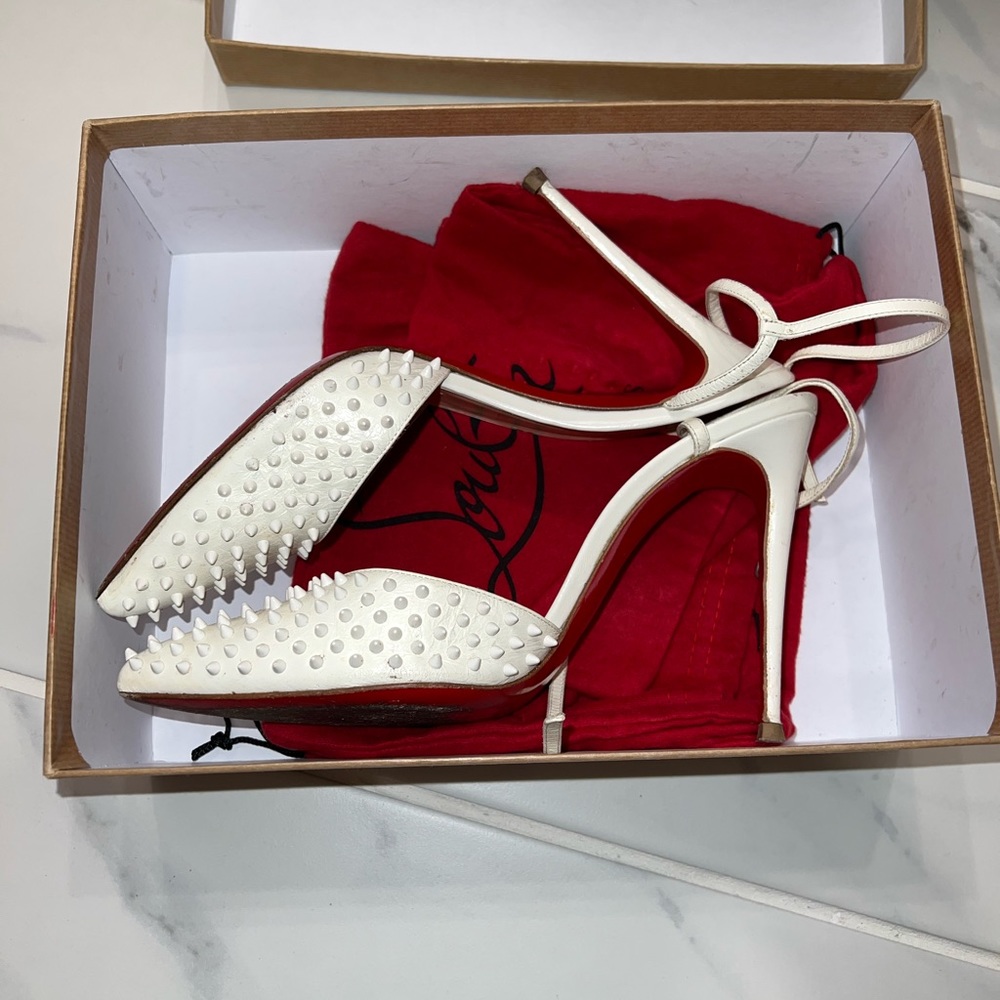 White Louboutin heels, runs small so ideally fits a 39!
